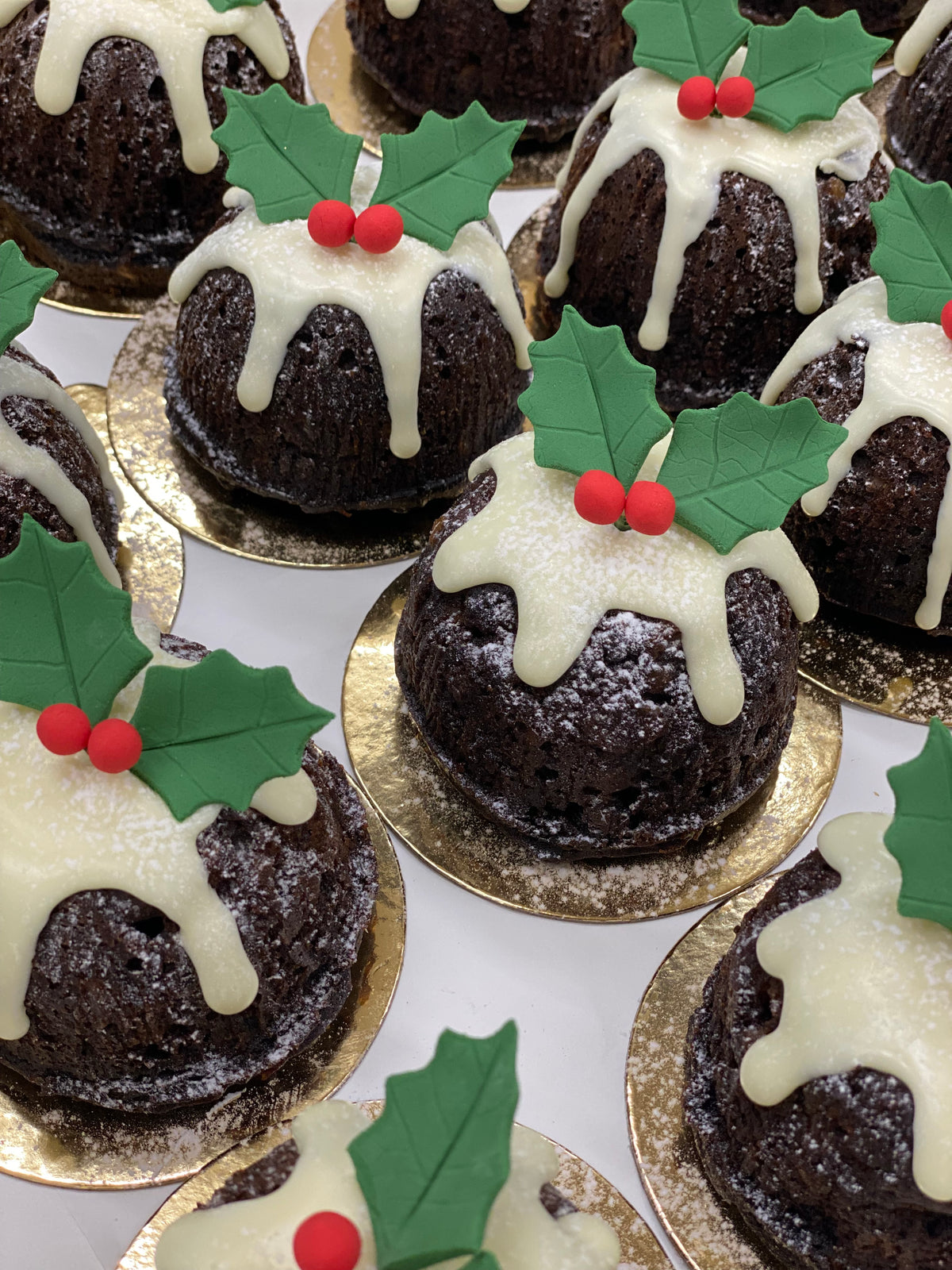 Individual Puddings with Rum Sauce